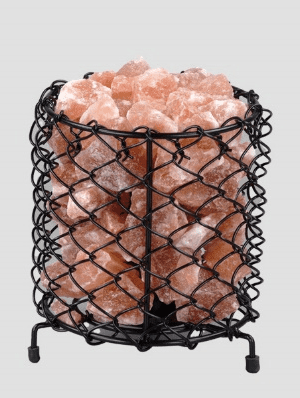 Modern cylindrical black wire mesh basket filled with authentic Himalayan pink salt chunks by Suhail Salt, a premier pink salt manufacturer and global exporter.