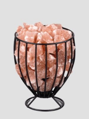 Decorative tulip-shaped black metal wire basket filled with natural Himalayan pink salt crystals by Suhail Salt, a premier pink salt manufacturer.